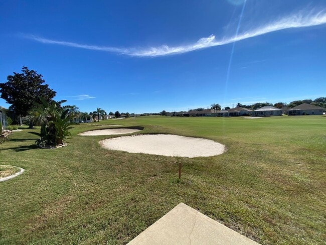 Building Photo - ANNUAL Lease – Unfurnished – Golf Course Lot - Designer Home in the highly sought-after gated com...