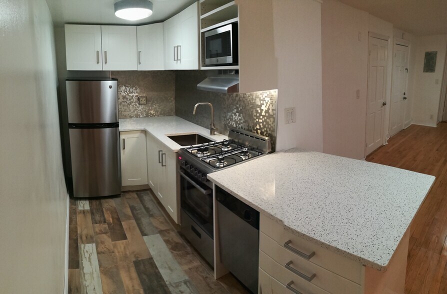 Newly renovated kitchen. New everything. Lots of storage plus a dishwasher. - 182 Carlton Ave