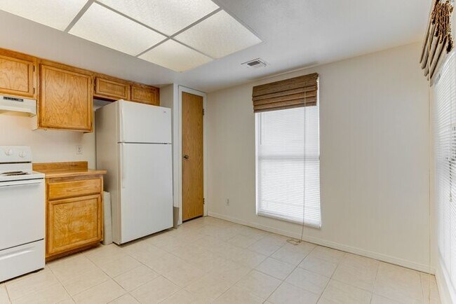 Building Photo - Charming 2 Bed, 2 Bath Condo with Fireplace & Balcony! 89011