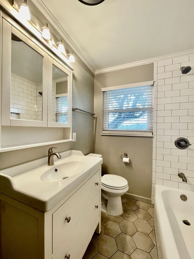 Building Photo - Updated Home w/ 2 Car Garage, Backyard and...