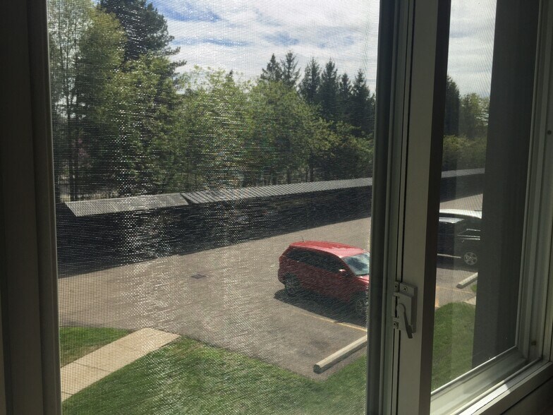View of assigned carportCarport - 1814 Colonial Village Way
