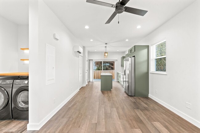 Building Photo - Brand new 2 bed/2 bath, central a/c, dishwasher, washer & dryer, deck & patio! March rent free!