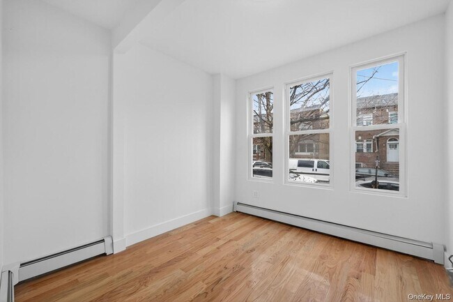 Building Photo - 25-61 99th St
