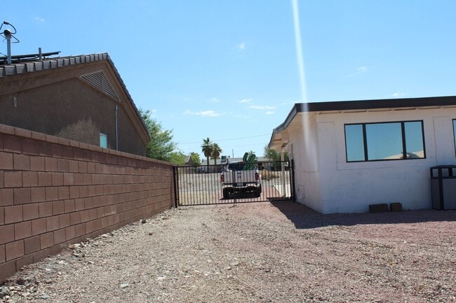 Building Photo - Long Term Rental! Available Unfurnished OR...