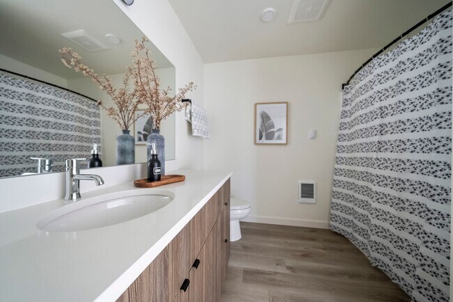 Building Photo - Edgewater Apartments: Tranquil Canal-Side ...