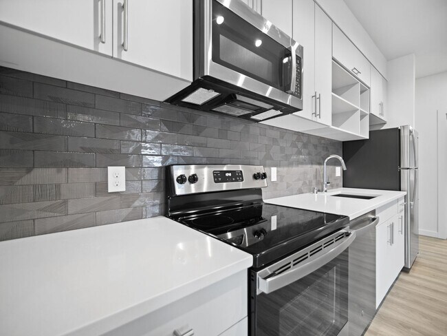 Building Photo - Flats on 4th Apartments