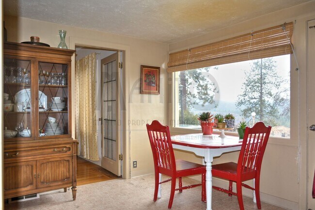 Building Photo - **COMING SOON** Beautiful Down River Brick Bungalow with River Views