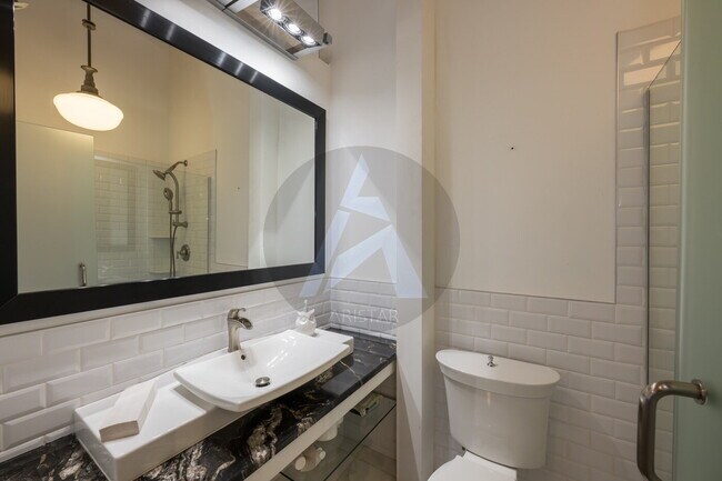 Building Photo - Luxury Penthouse Loft – 3,200 sq. ft. Down...