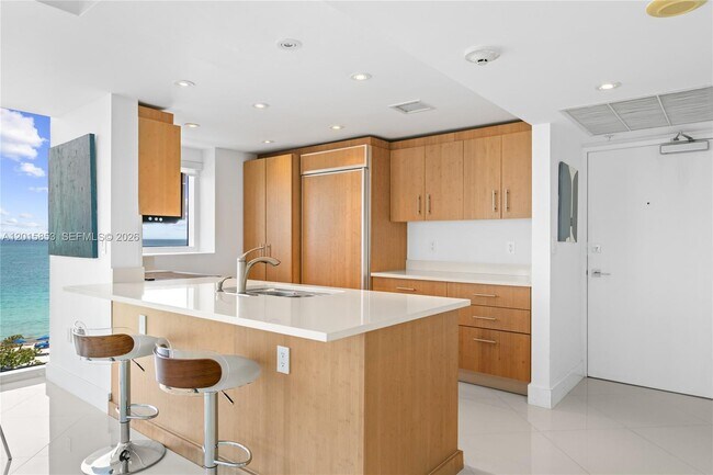 Building Photo - 10275 Collins Ave