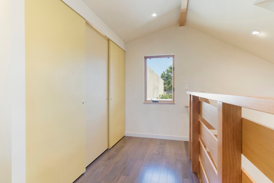 Bedroom loft toward east - 952 60th St