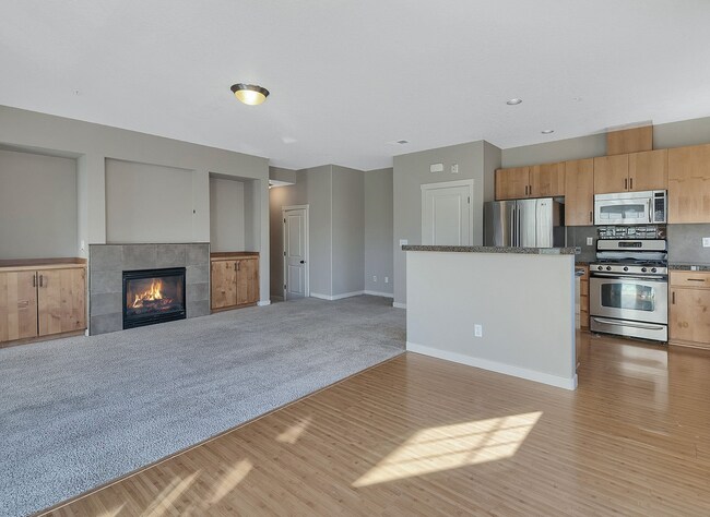 Building Photo - 2BR + 2.1BA Corner Townhome-Style Condo — Dual Primary Suites, Attached Garage & Most Utilities I...