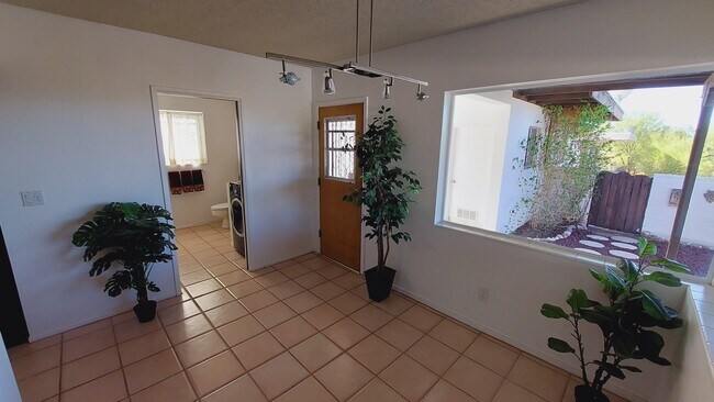 Side entry from patio and garage - 5161 E Camino Bosque