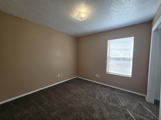 Building Photo - 3984 Rancher Loop NE