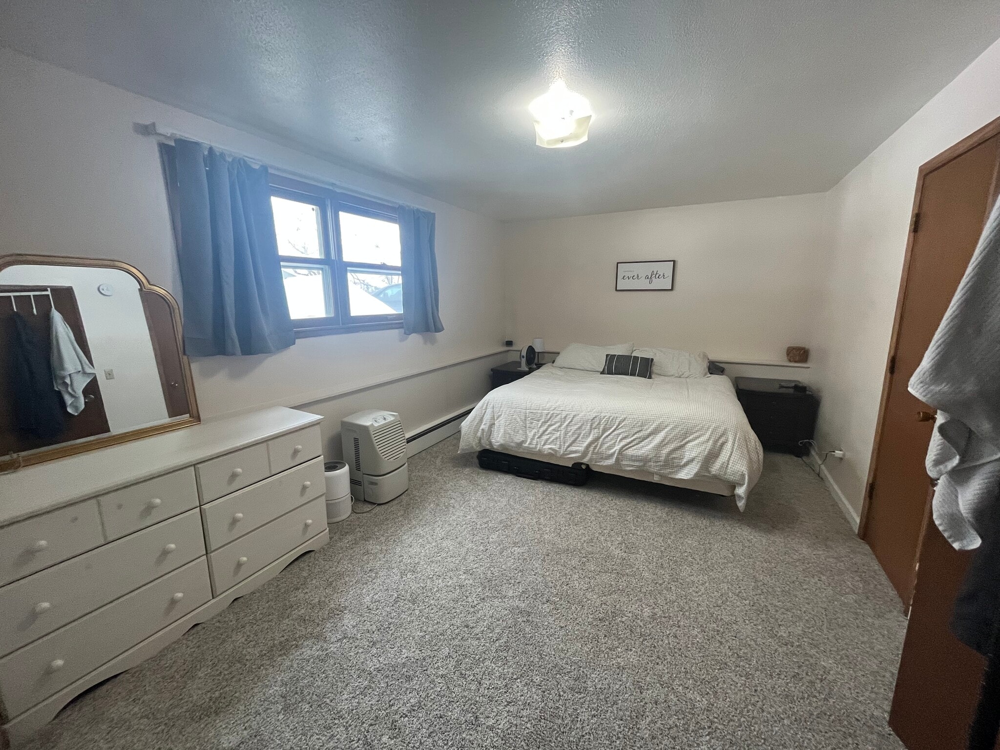 Large bedroom (downstairs) - 4995 Tyler St NE