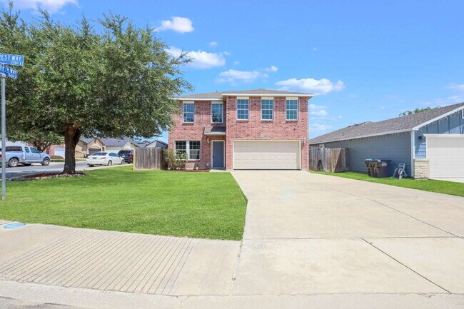 Building Photo - Spacious 4-bedroom, 2.5-bath home with 2,3...