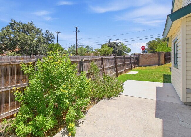 Building Photo - Corner-Lot Garden Home with a Private Patio.
