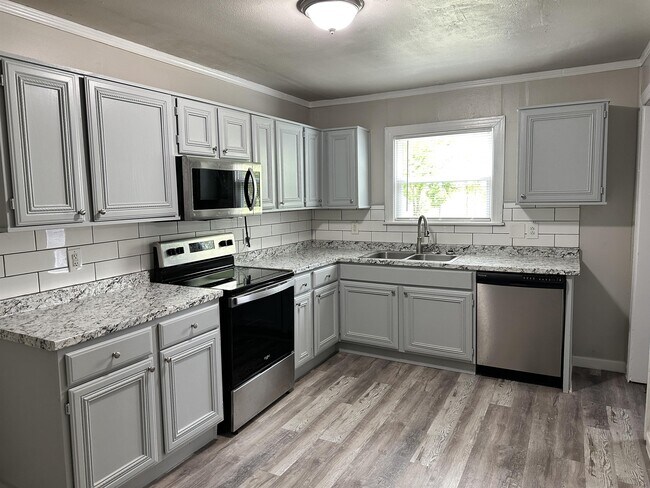 Building Photo - 1409 Wolfe City Dr