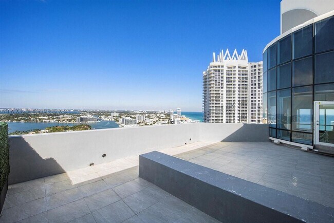 Building Photo - 6301 Collins Ave