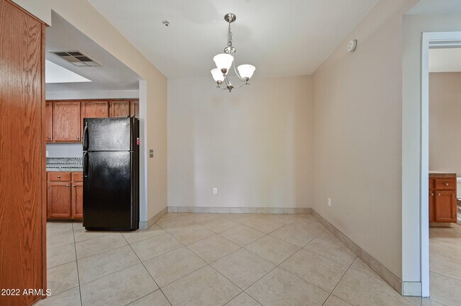 Building Photo - 9451 E Becker Ln