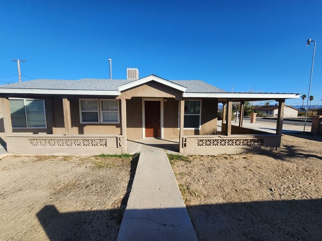 Primary Photo - REMODELED 4 BEDROOM 2 BATH WITH 3 CAR GARAGE!