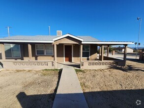 Building Photo - REMODELED 4 BEDROOM 2 BATH WITH 3 CAR GARAGE!