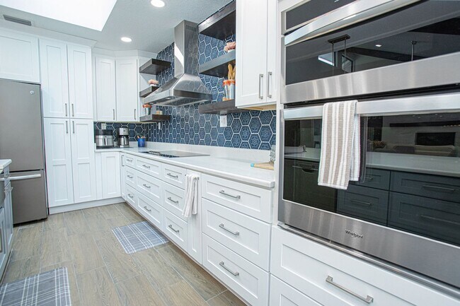 Building Photo - Beautifully Updated 3/2 Pool Home with Large Backyard in Lake Ajay (Gated Community)