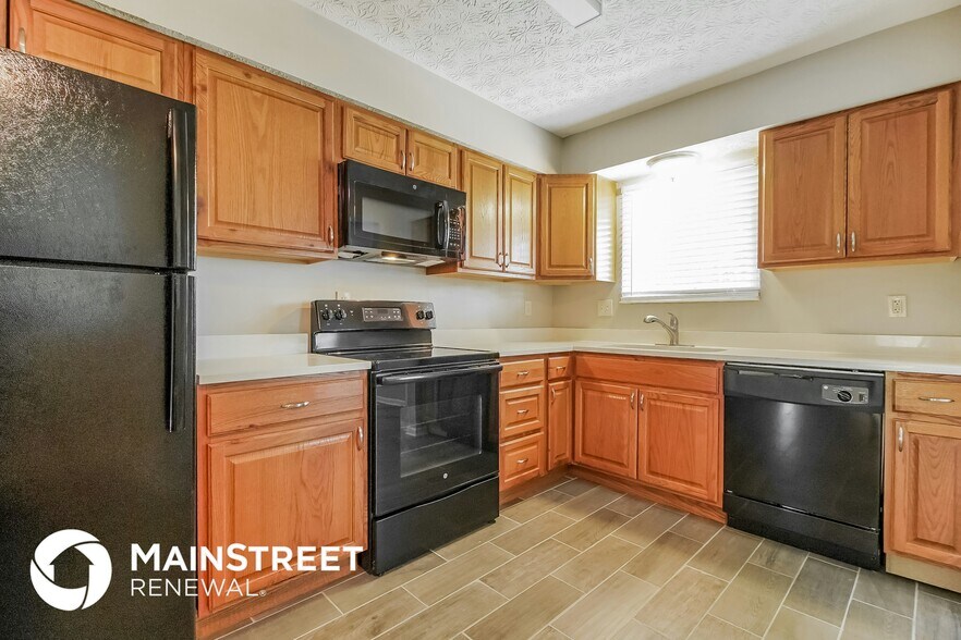 Building Photo - 6560 Benjamin Dr