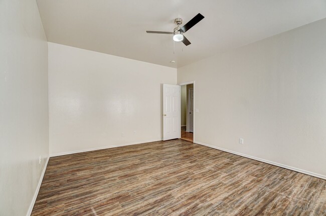 Building Photo - Spacious 4-Bedroom Home with Corner Firepl...