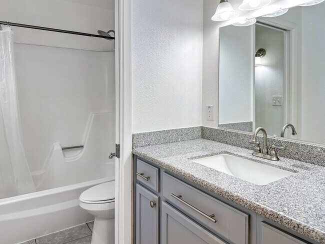 Building Photo - Charming 4-Bedroom with Modern Upgrades in Prime Location