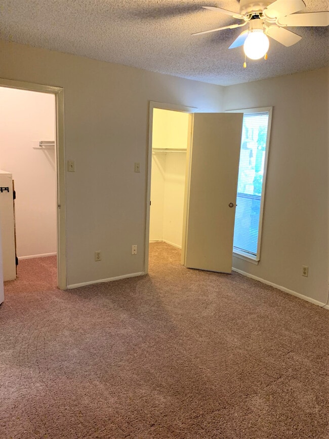 Building Photo - FIRST-FLOOR 2-BEDROOM AT WOODMONT TOWNHOMES