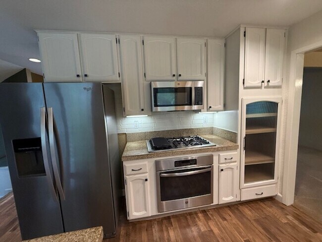 Building Photo - OPEN HOUSE this Wednesday 5pm-6:30pm - Private Redwood Setting | 4BR Home with Family Room, Bar &...
