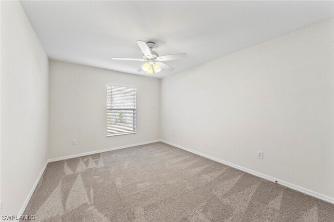 Building Photo - 4BR Home in Gated Town Lakes Community with Lake View