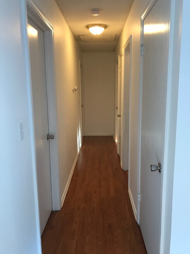 hallway to bedrooms, bathroom and basement - 85 Wilson Ave