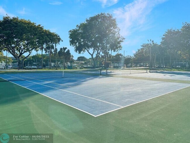 Building Photo - 6090 N Sabal Palm Blvd