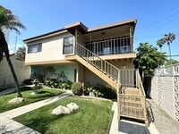 Building Photo - Stunning 2nd Floor Duplex in Back of Prope...