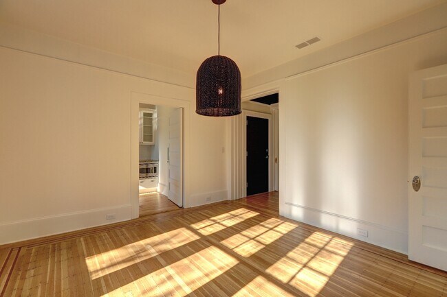 Dining Room to Kitchen and Foyer with Original Pocket Doors - 75 17th St NE