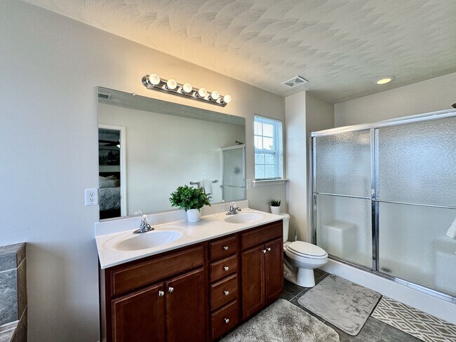 Building Photo - First-Time Rental, Available July 1st! Attached Garage - 2 Primary Suites - Pet-Friendly (Under 4...