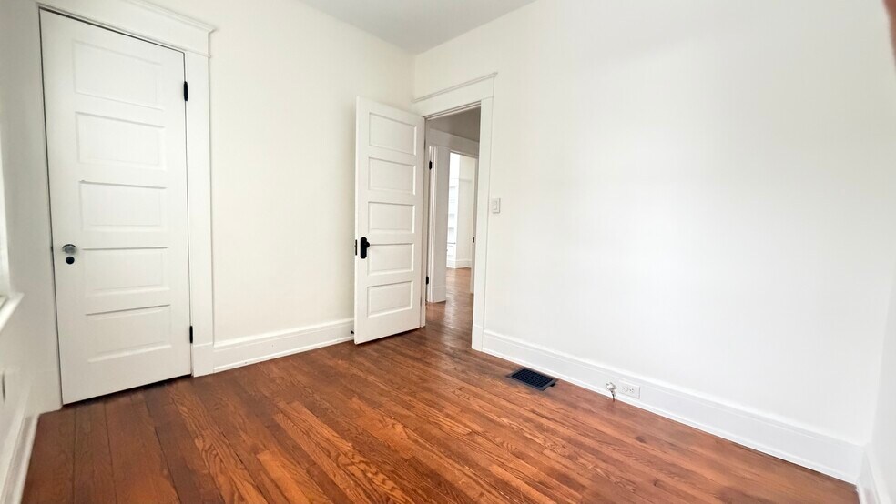 Bedroom 1 fits queen side bed and desk or dresser - 693 Linwood Ave