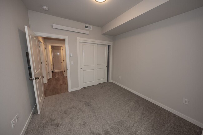 Building Photo - Brand New! - 2 Bedr in Gated Community - Free xfinity Internet