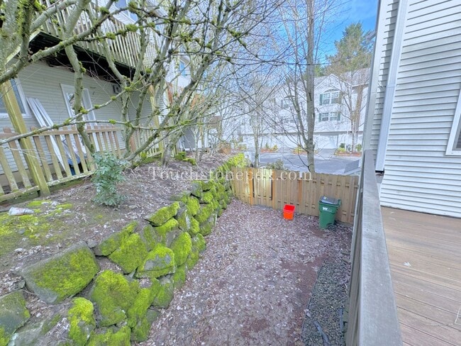 Building Photo - Light Filled 3 Bedroom Townhome with Deck, Attached Garage, and AC