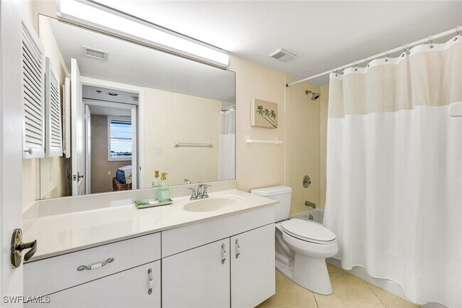 Building Photo - 6361 Pelican Bay Blvd