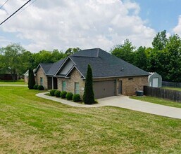 Building Photo - Custom Built Home with Fenced Yard
