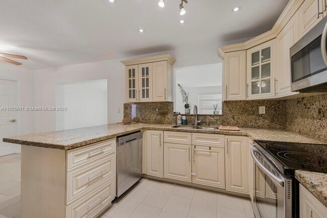 Building Photo - 5850 SW 149th Ave