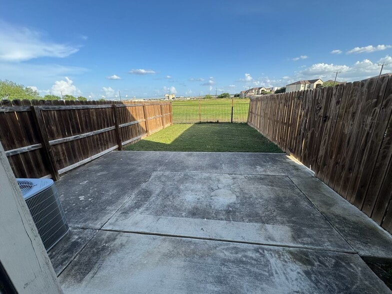 Backyard with large patio and open view - 16715 Jupiter Haven