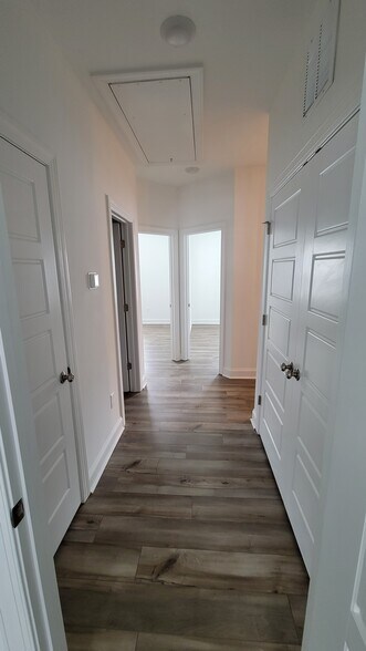 Hallway on upper level - 506 Village Branch Ln