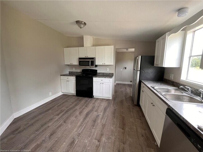 Building Photo - 3-Bedroom and 2 Bathroom Mobilehome