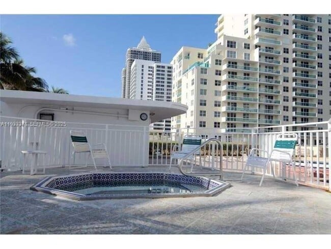 Building Photo - 5005 Collins Ave