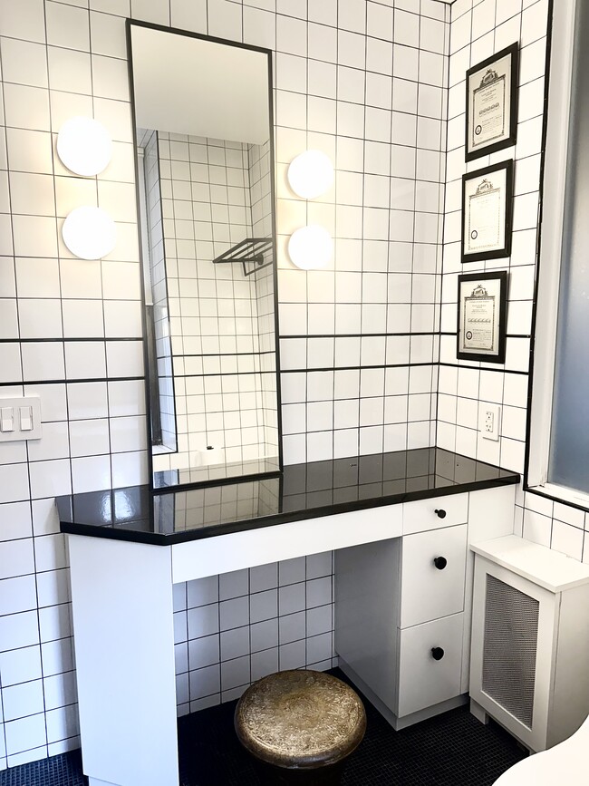 Separate vanity with hook ups for hair dryer - 790 Riverside Dr