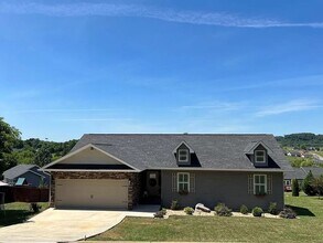 Building Photo - Stunning 3-Bedroom Home with Deck, Patio & Large Yard in Kodak, TN