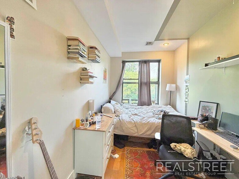 Building Photo - A Sunlit Bushwick Residence Designed for Modern Living